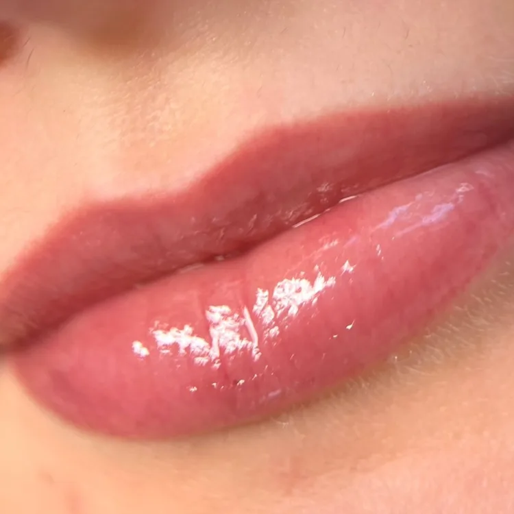 Healed lip blush tattoo result — soft mauve-rose, natural and settled six weeks on